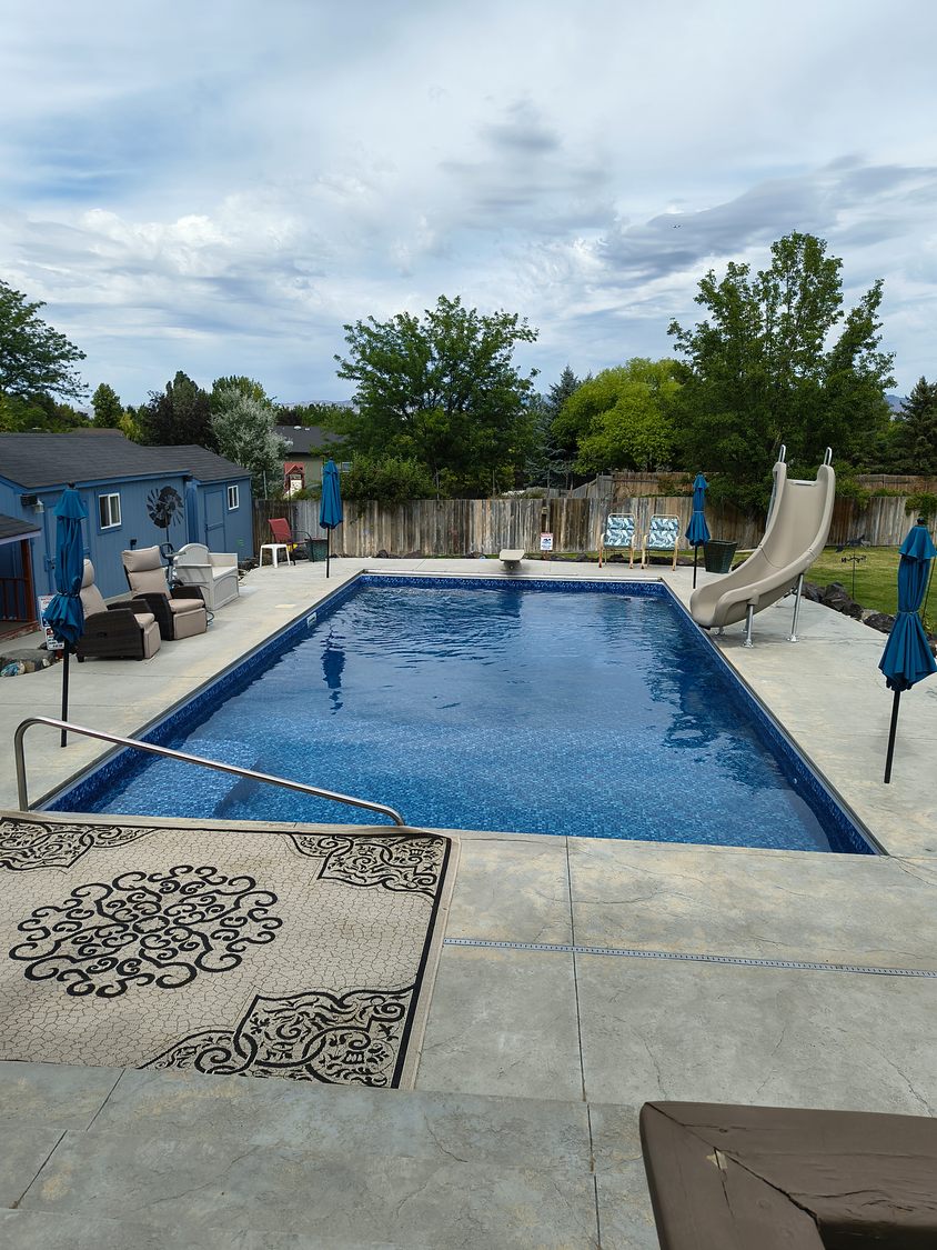 Completed family swimming pool with slide